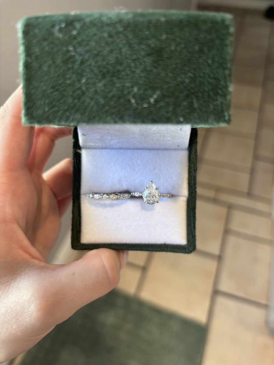 Pear-Cut Solitaire Moissanite Engagement Ring and Matching Band Set in Green Velvet Box