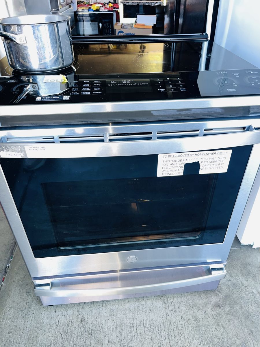 $1550 OBO NEW INDUCTION SLIDE RANGE GE 5 BURNERS