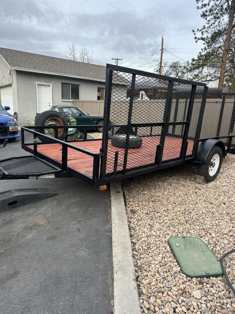 2013 Explorer 14 X. 7 Trailer ( 2 Ramps)