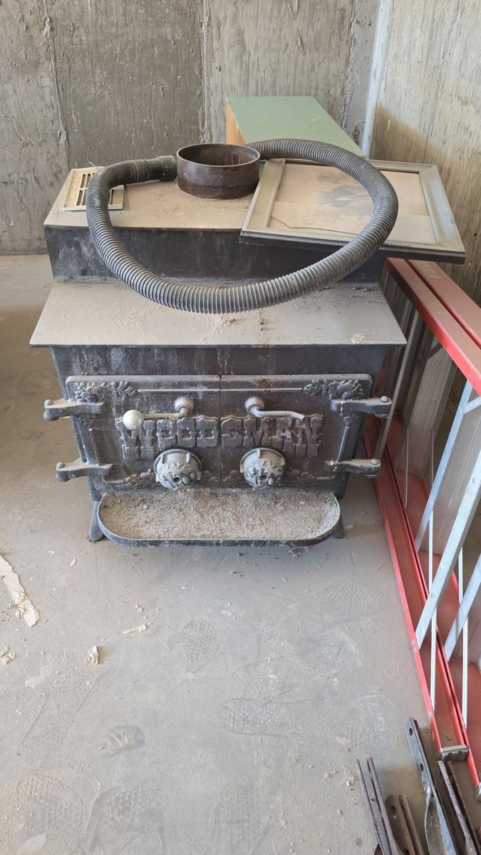 Vintage Woodsman Cast Iron Wood Burning Stove