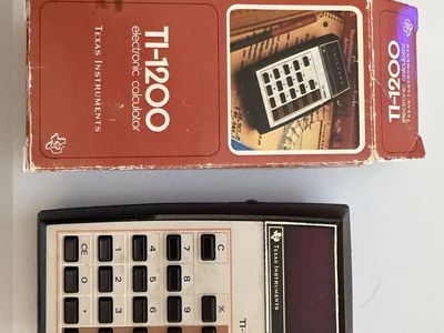 Vintage TI-1200 electronic calculator