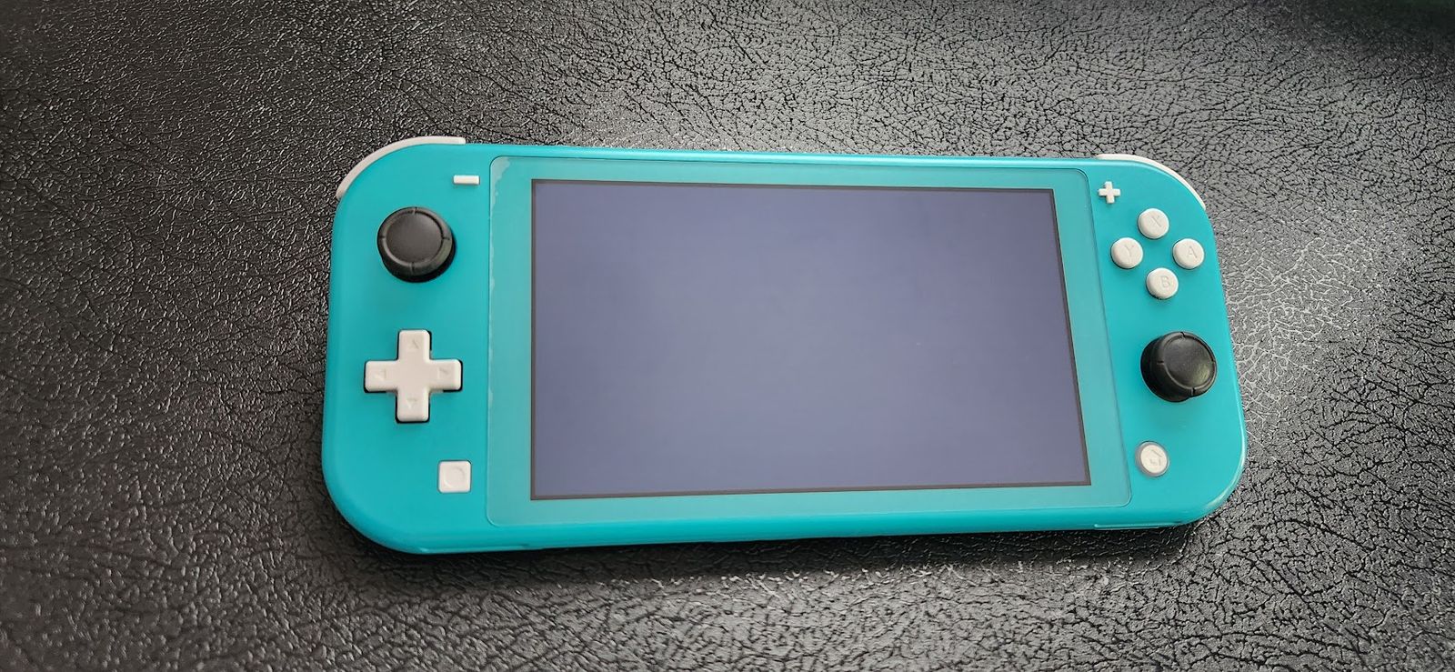 Nintendo Switch Lite Turquoise + Charger + 128GB SD Card