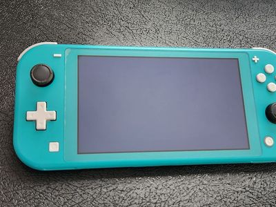 Nintendo Switch Lite Turquoise + Charger + 128GB SD Card