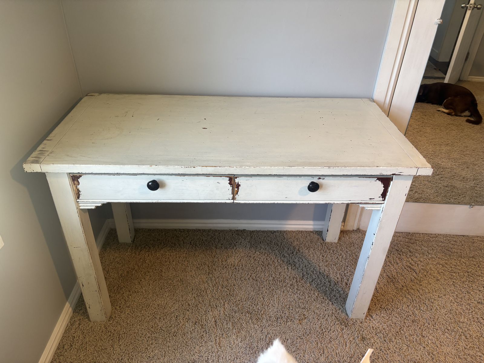Solid wooden desk with built in drawers.