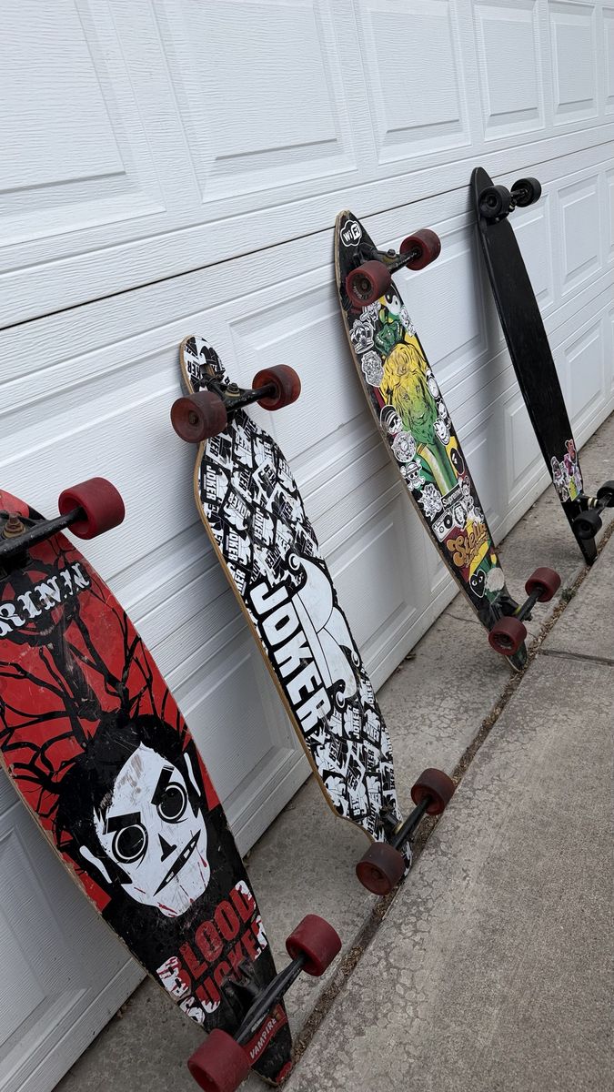 Lot of Assorted Longboards Skateboards Various Graphic Designs