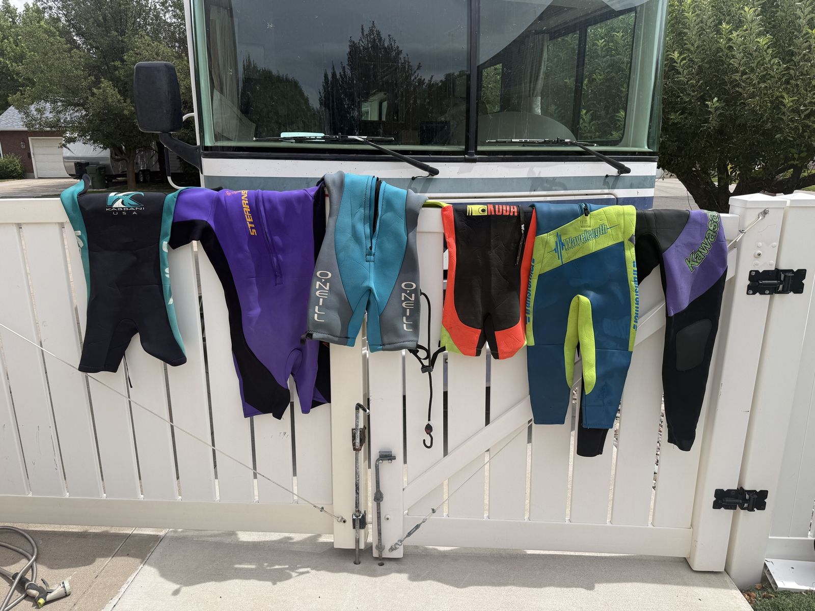 Several Wet Suits from kids to Adult XL