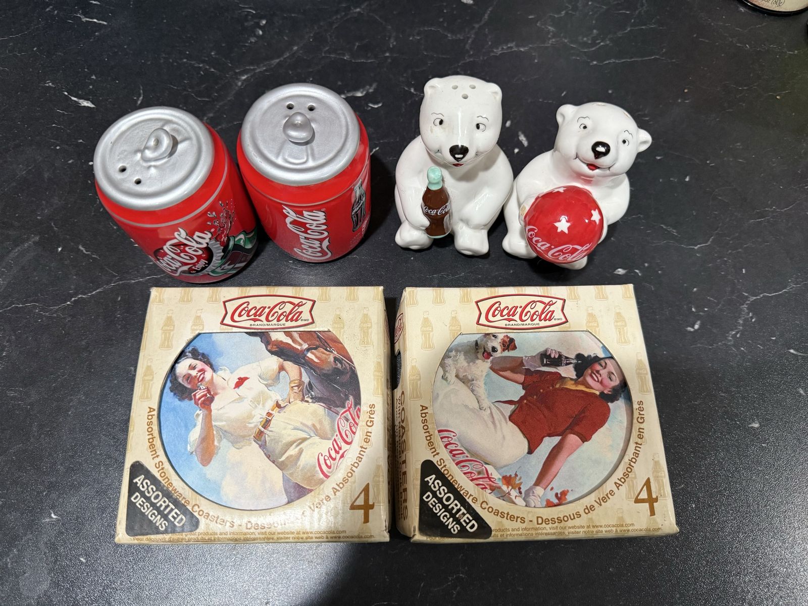 Collectible Coca-Cola salt and pepper, shakers, and coasters