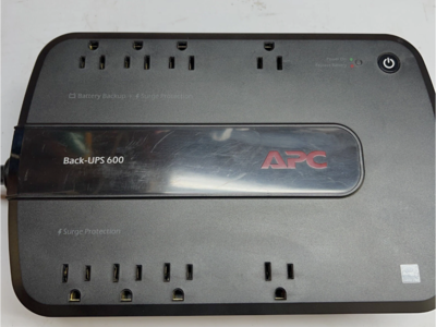 APC BN600G Uninterruptible Power Supply with Surge Protection Battery Backup includes used Battery