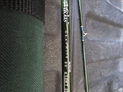 2 fly rods with reels and double case