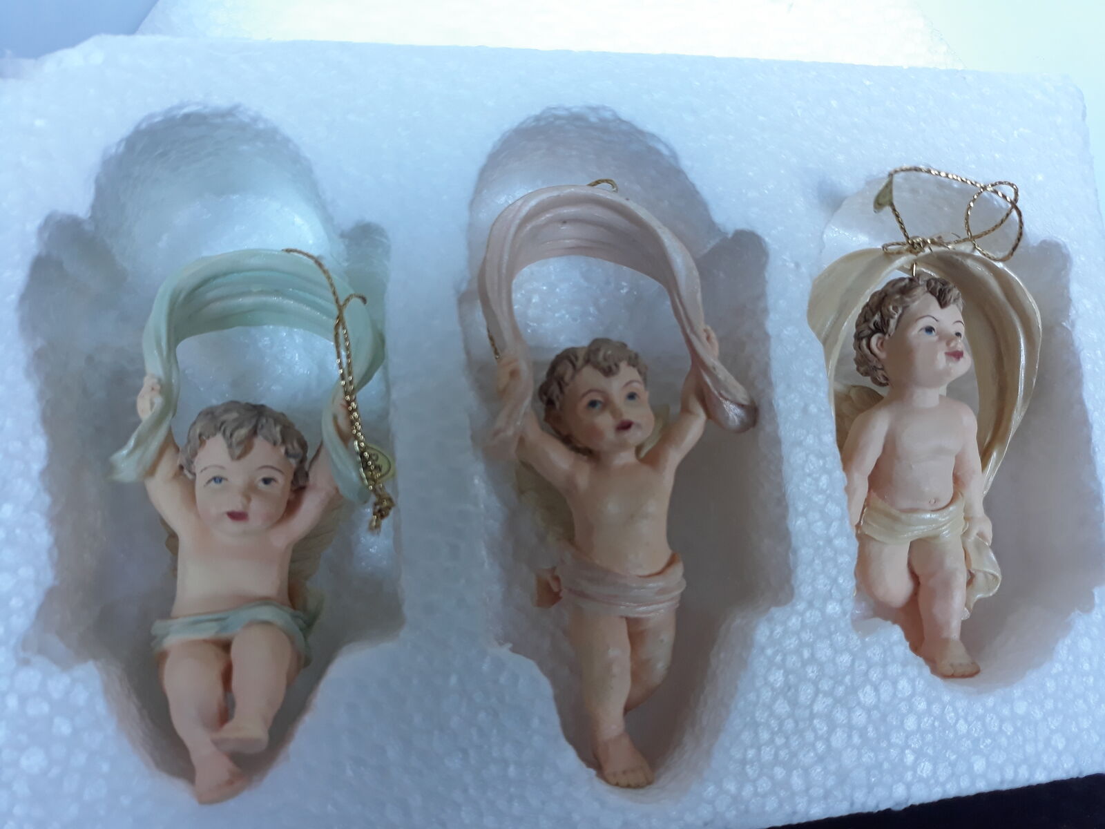 Collectible set of cherub Christmas ornaments