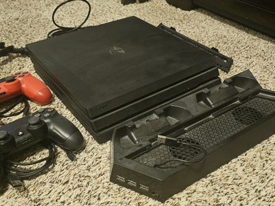 Sony PlayStation 4 Console with Two Controllers and Stand