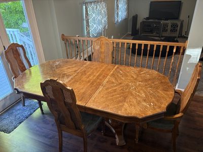 Big, old, sturdy, wooden dining room table w/ chairs