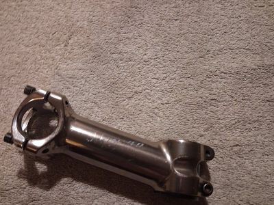 Thomson Elite X4 aluminum bicycle stem in a polished silver finish.