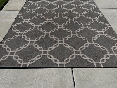 Large Gray and White Geometric Pattern Area Rug used outdoors 7’9” x 10’