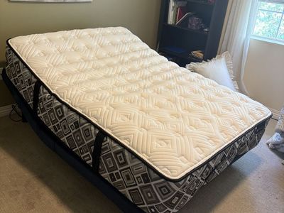 Excellent condition Full size bed with adjustable frame PENDING PICKUP