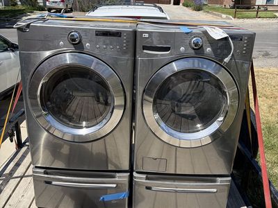 LG Front-Load Washer and Gas Dryer Set with Pedestals - Stainless Steel Finish