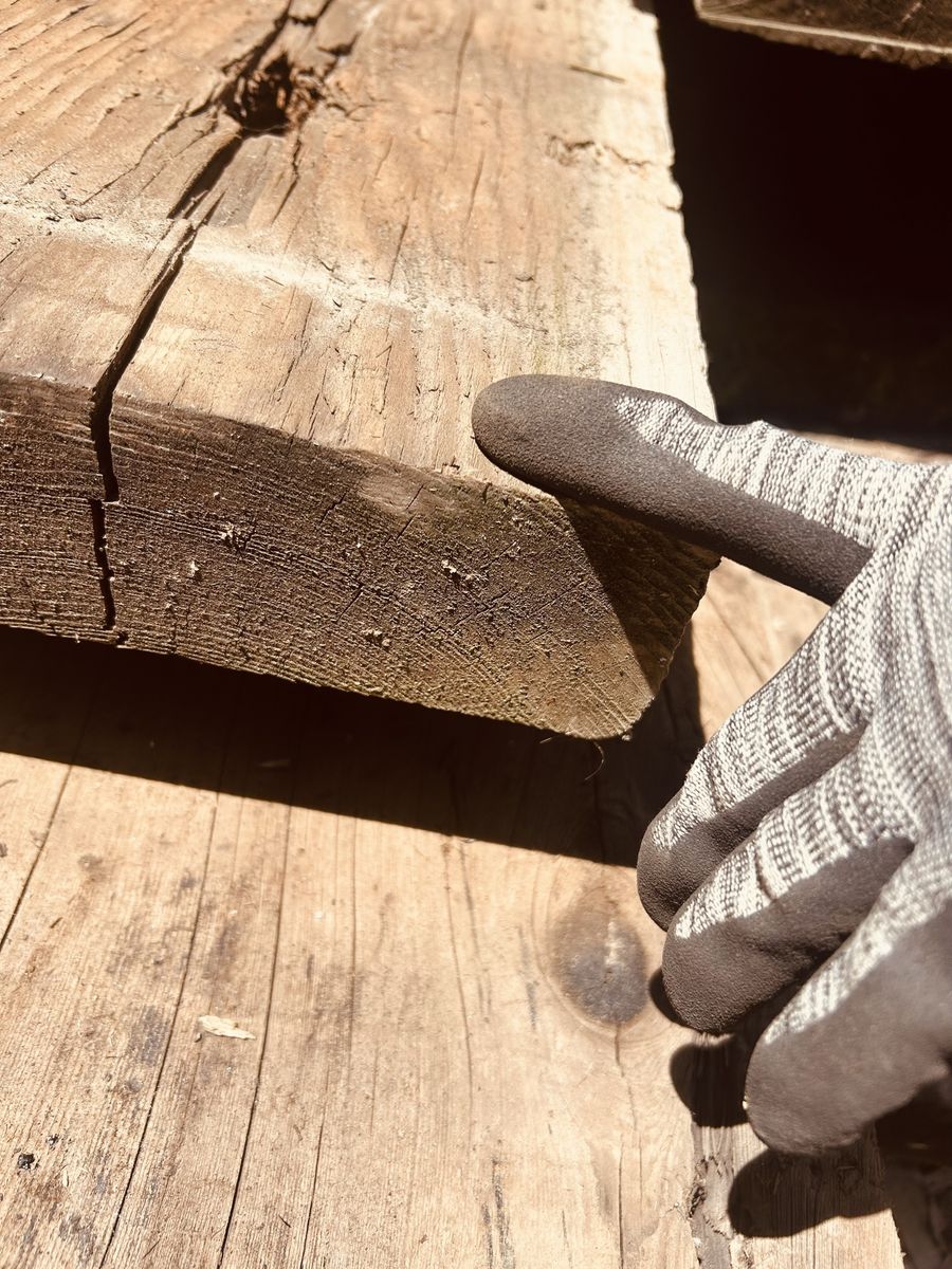 Rough cut red wood planks