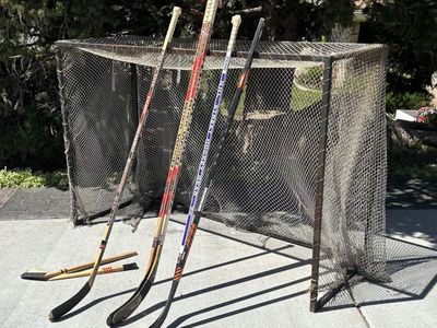 Vintage hockey net and sticks