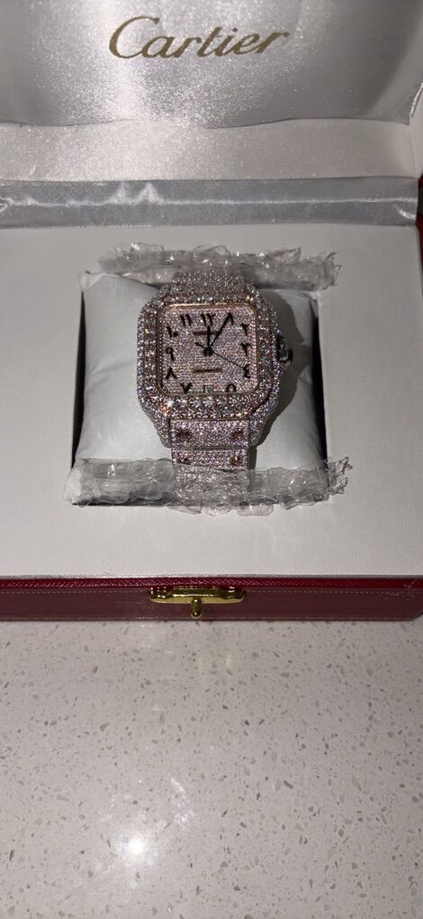 FULLY ICED CARTIER TIMEPIECE