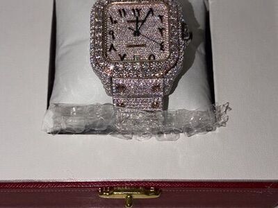 FULLY ICED CARTIER TIMEPIECE