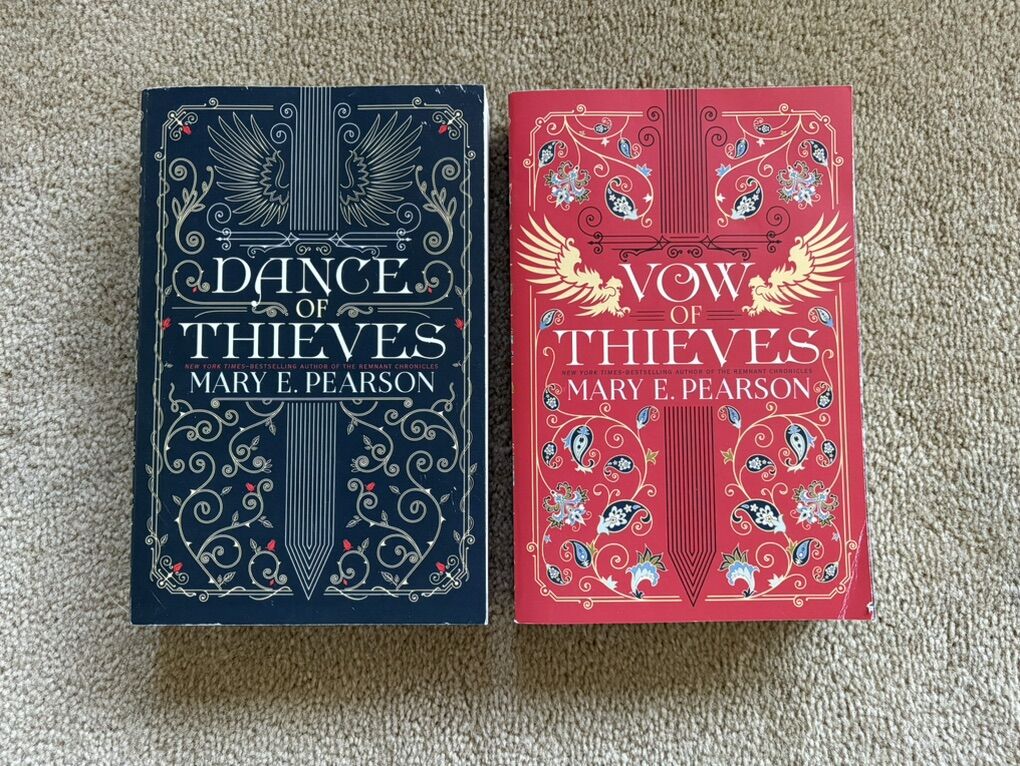 Dance of Thieves and Vow of Thieves, by Mary E. Pearson (paperbacks)
