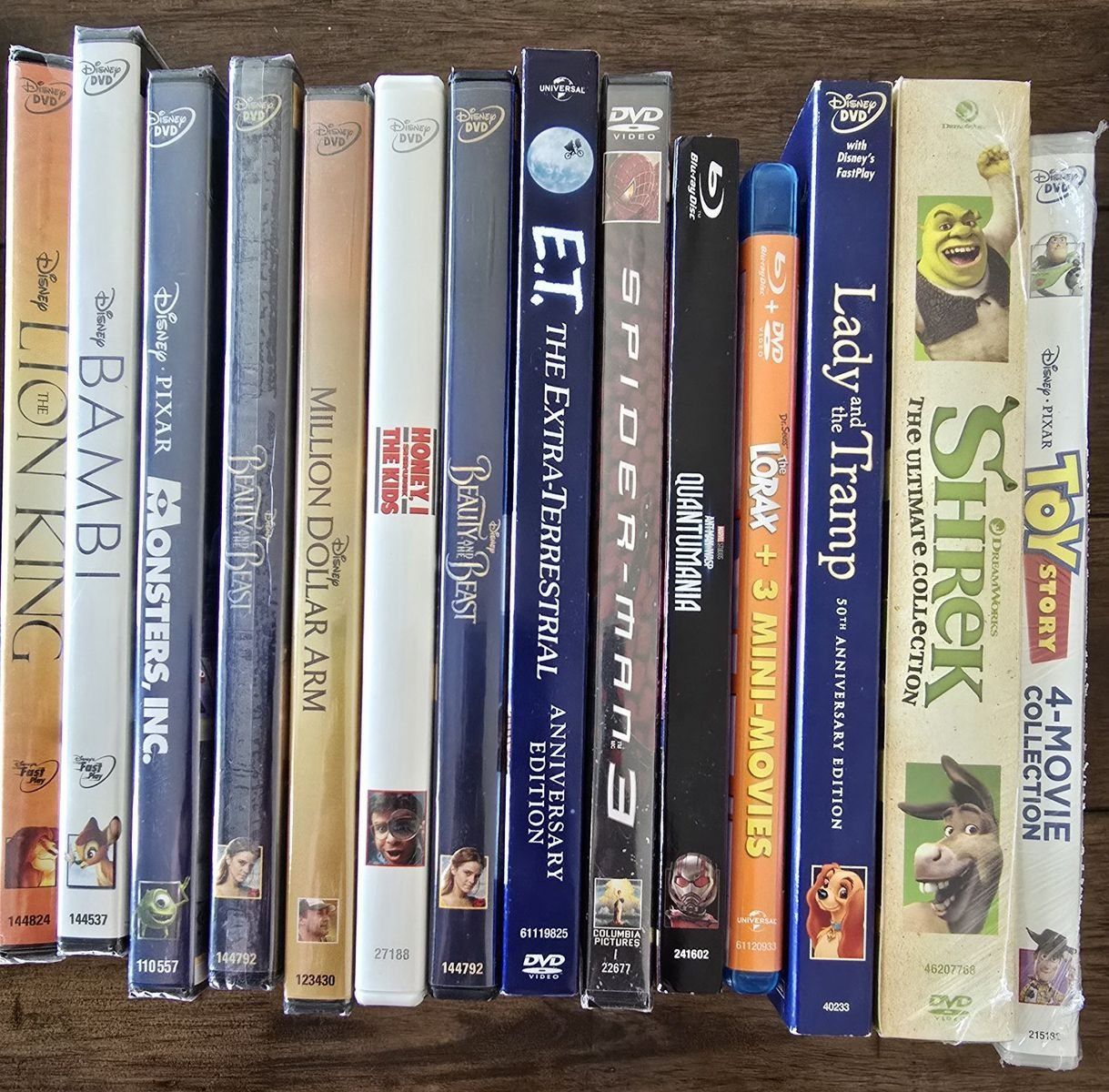 14 DISNEY MOVIES,  10 UNOPENED