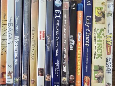 14 DISNEY MOVIES, 10 UNOPENED