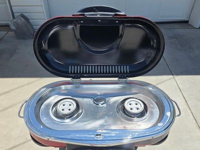 Coleman RoadTrip LXX Portable 2 burner Propane Grill.