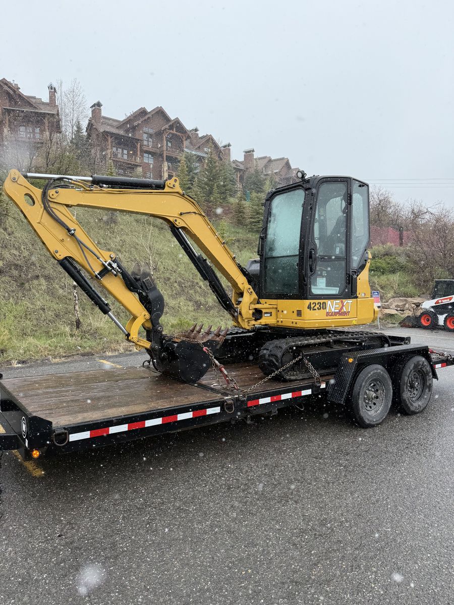Cat 304, 40 Class Mini Excavator for Rent! Dump Trailer or Flatbed Trailer Combos available. Thumb and Blade