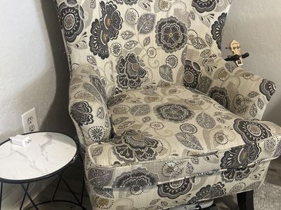 Grey and cream wingback chair
