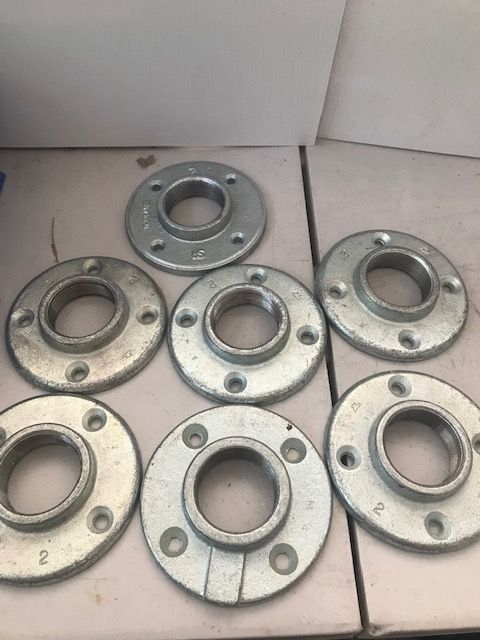 Qty 7- 2" threaded floor flanges & Qty 6- 1-1/2" floor flanges