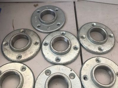 Qty 7- 2" threaded floor flanges & Qty 6- 1-1/2" floor flanges