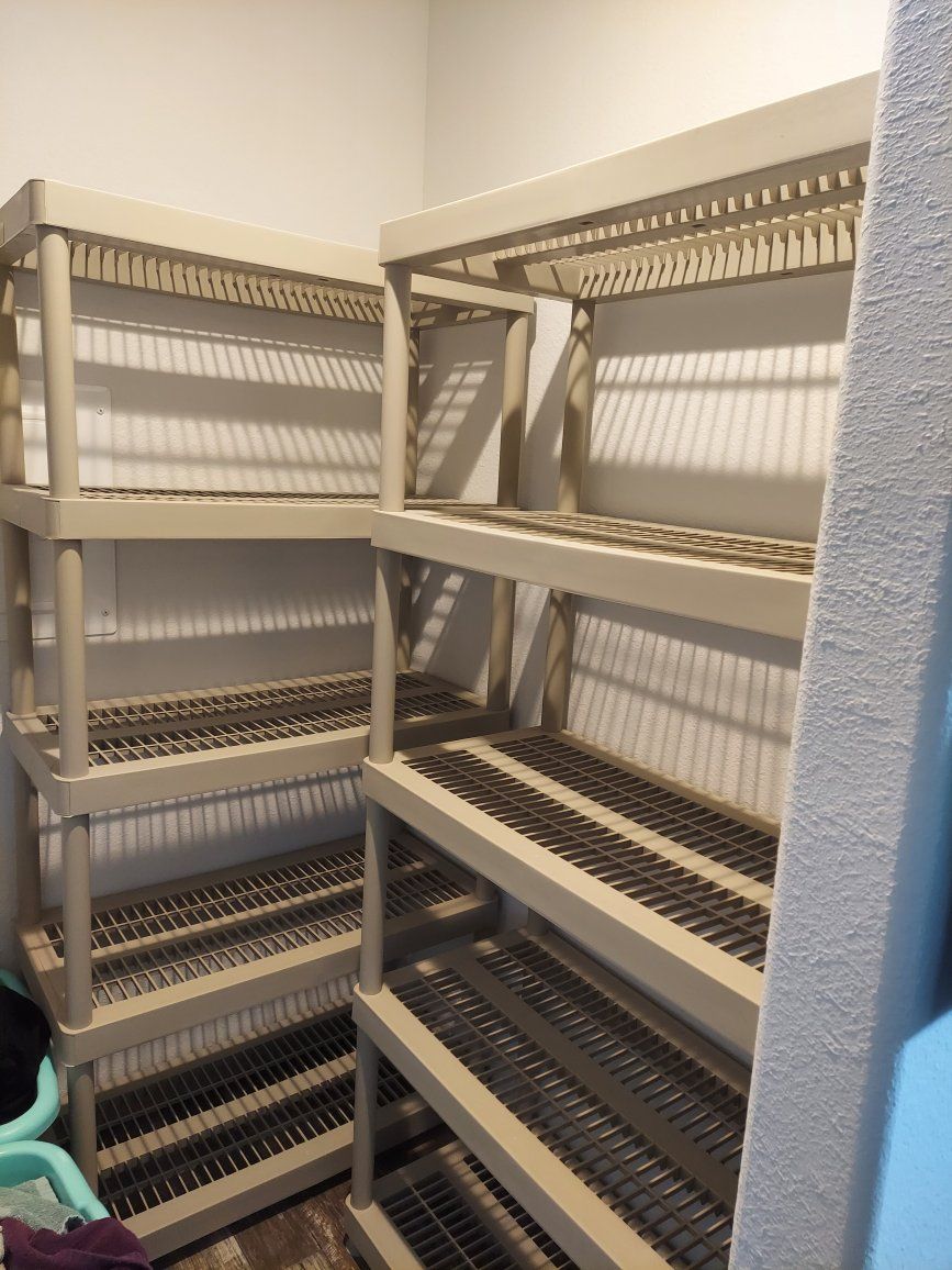 Two Large Plastic Shelves