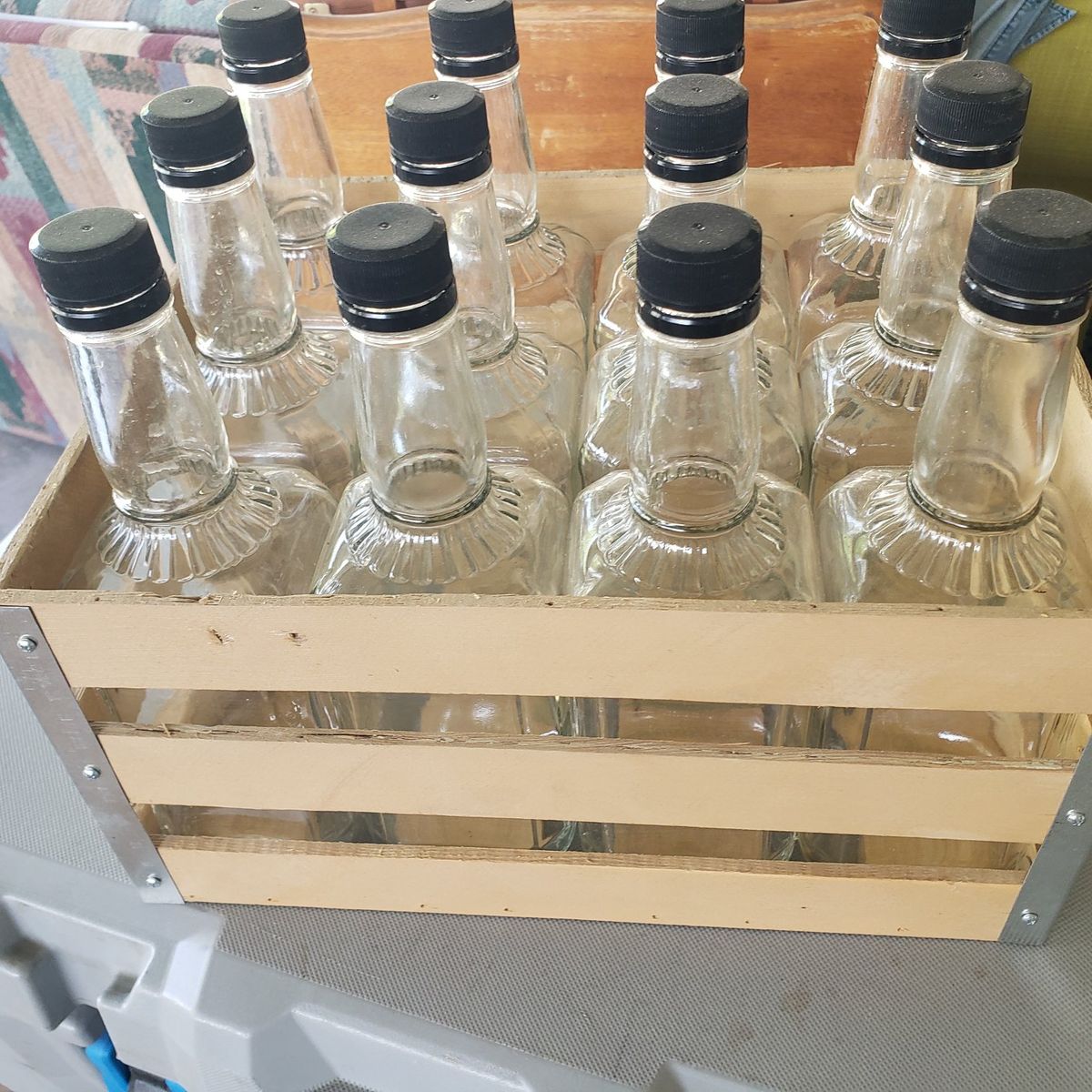 hand crafted create with whiskey bottles