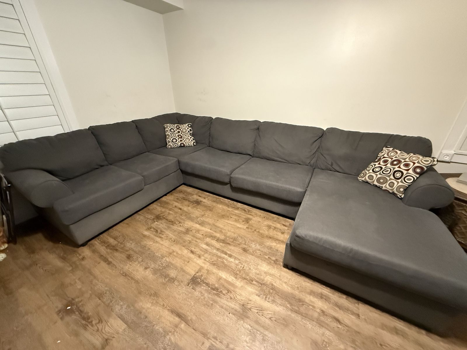Large Dark Gray Fabric Sectional Sofa with Chaise and Accent Pillows