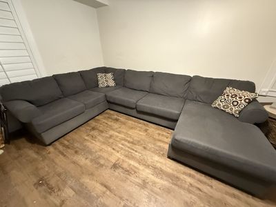 Large Dark Gray Fabric Sectional Sofa with Chaise and Accent Pillows
