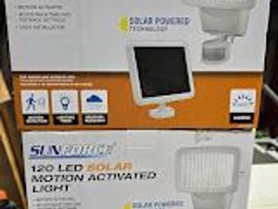 Motion detector solar powered spotlight