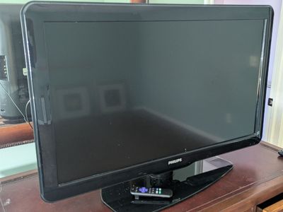 Televisión with Roku Stick and remote