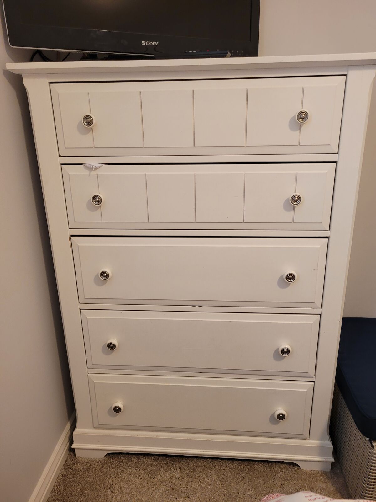 White dresser 38.5 wide, 53.5 tall, and 18 deep