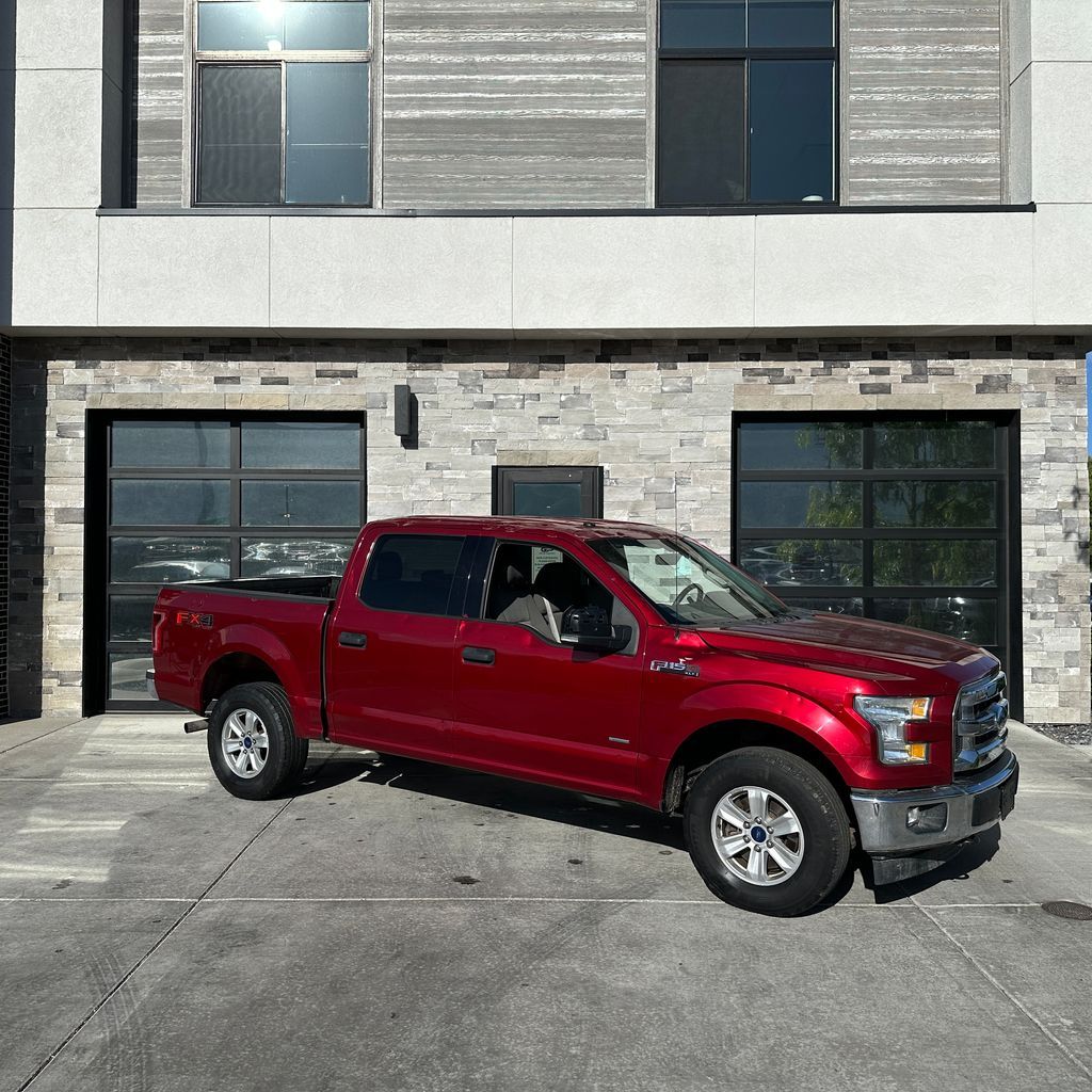 2017 Ford F-150 XLT — rebuilt & branded title, 7% below market