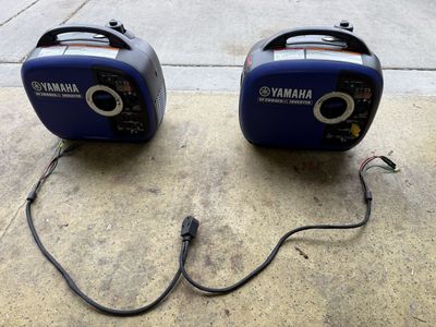 Two Yamaha EF2000IS Inverters With Pairing Cable For RV Hookup.