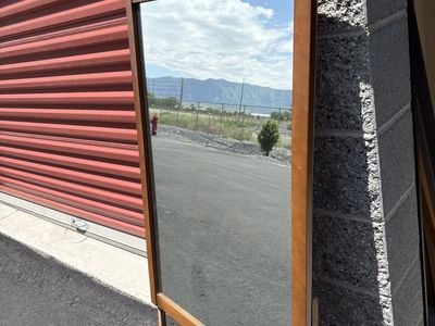 Large Mid Century Modern wooden wall mirror. Can be used on a dresser too. Vintage MCM