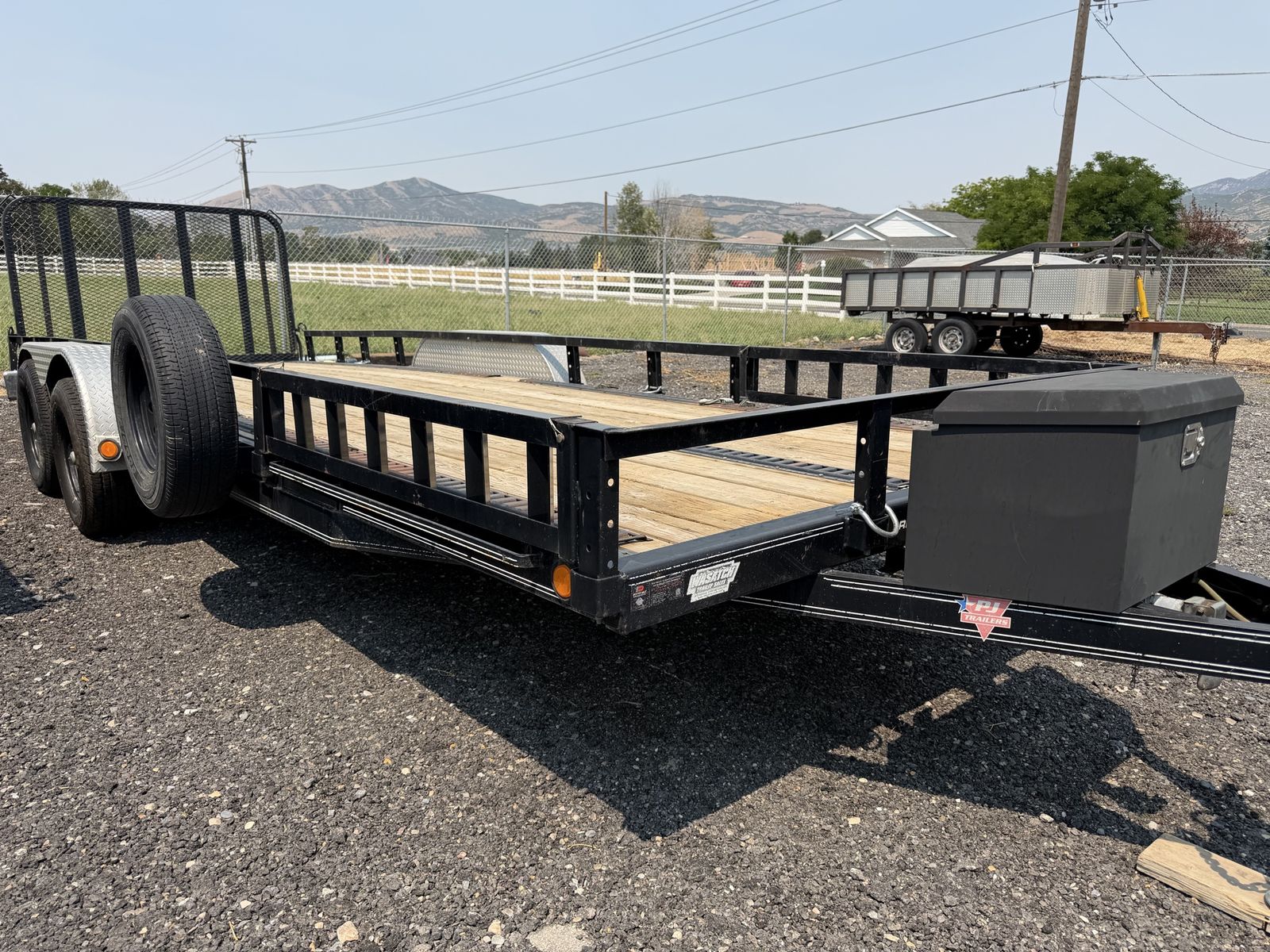 22 foot 10k GVWR PJ Trailers Heavy Duty Tandem Axle Utility Trailer with Rear Ramp Gate and Toolbox