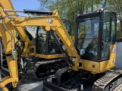 Rent My Cat Mini Ex. 302.7 With Retractable Tracks. 26 or 30 Class