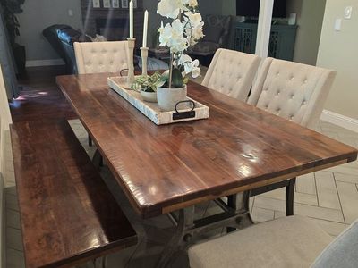 Table, bench, and chairs