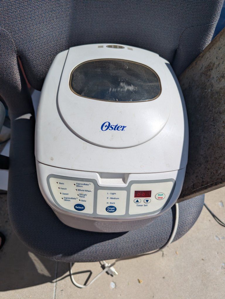 Oster ExpressBake Bread Maker, White - Model 5838 (or similar) with multiple settings