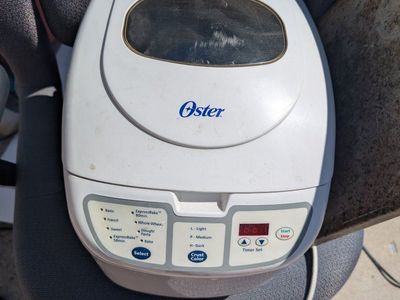 Oster ExpressBake Bread Maker, White - Model 5838 (or similar) with multiple settings