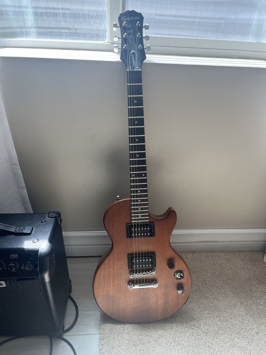 Epiphone Les Paul vintage edition electric guitar and Line 6 spider classic 15 amp
