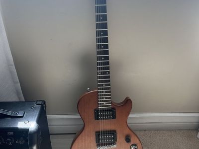 Epiphone Les Paul vintage edition electric guitar and Line 6 spider classic 15 amp