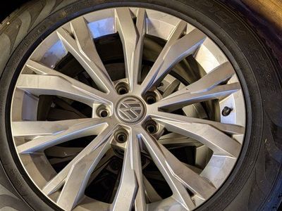 215/65 R17 VW Rims And All Season Tires